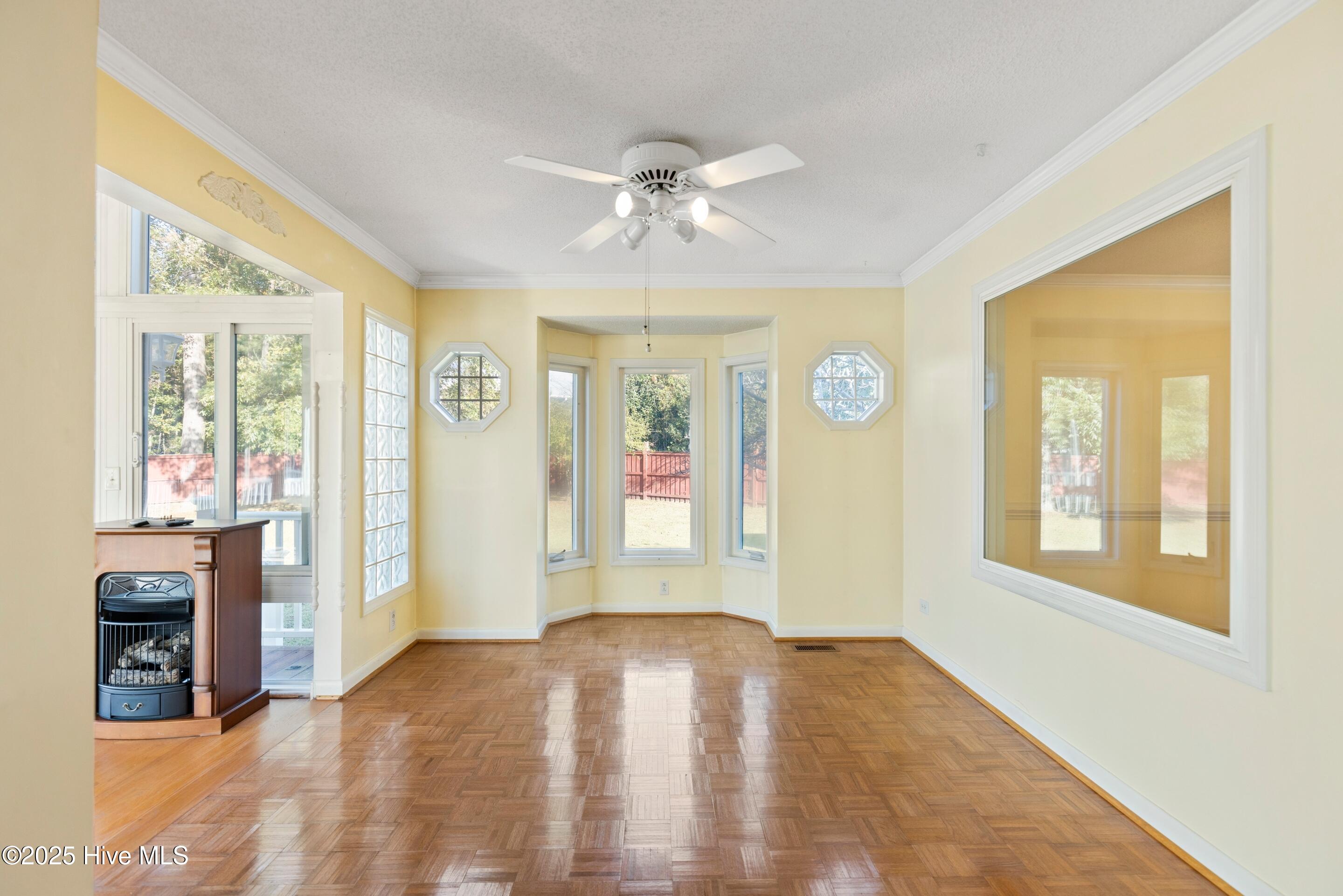 1501 Field View Road Wilmington, NC 28411 - Photo 20 of 57 Sitting room overlooking the sunroom.