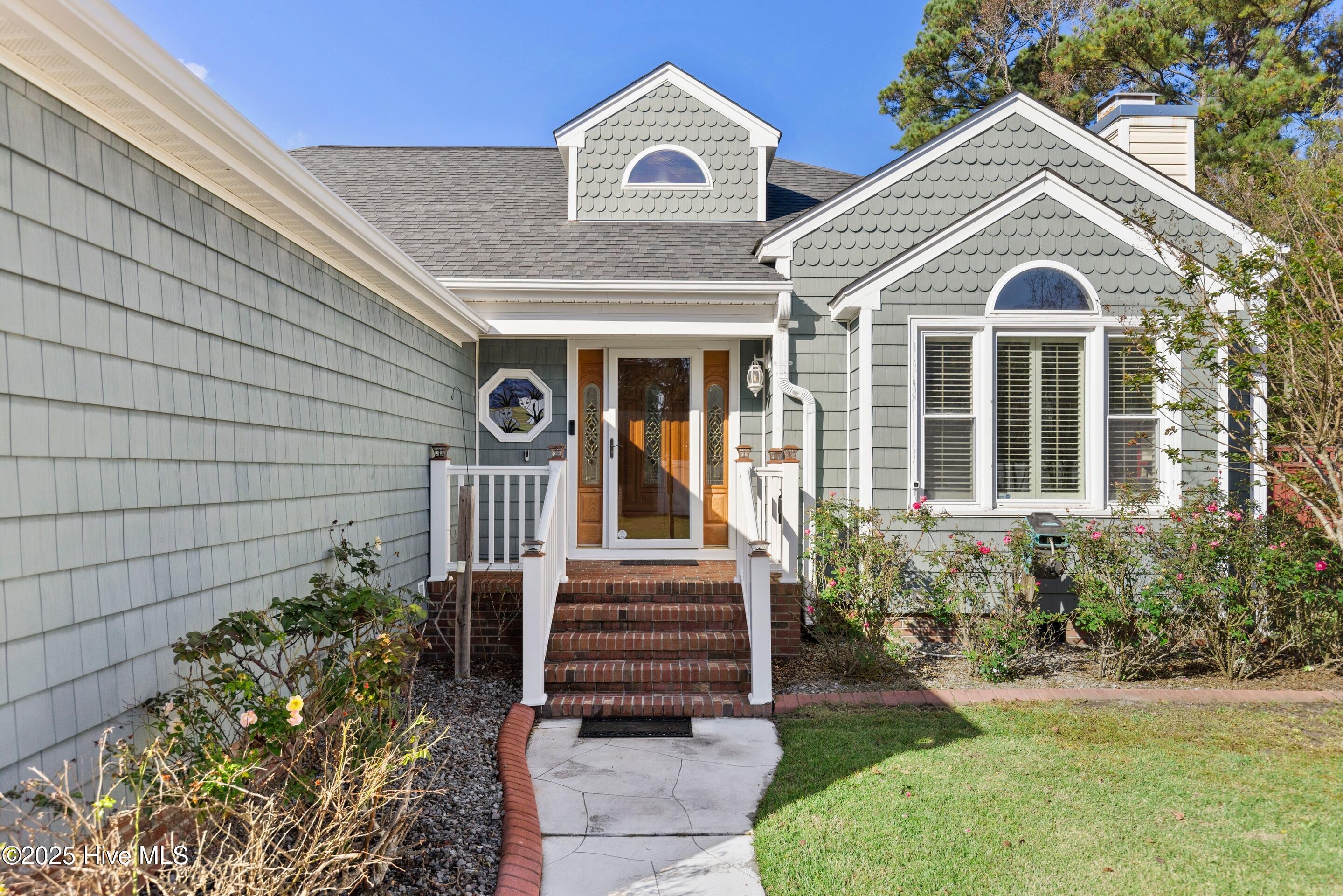 1501 Field View Road Wilmington, NC 28411 - Photo 2 of 57 Front porch with brick patio.
