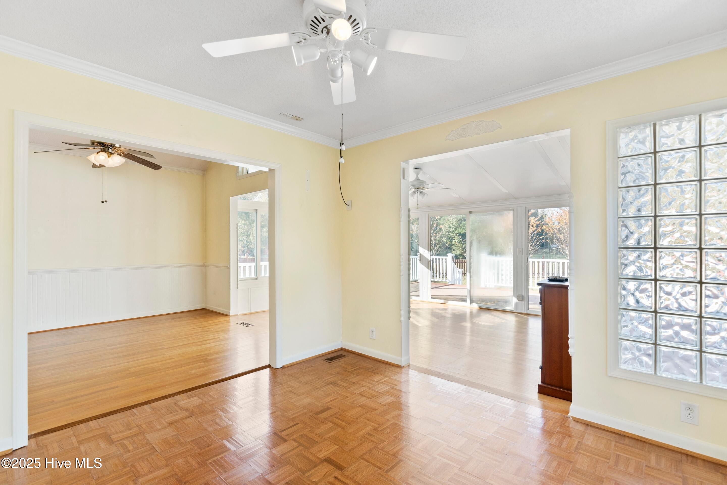 1501 Field View Road Wilmington, NC 28411 - Photo 22 of 57 Sitting room with parquet floors and lots of natural light.