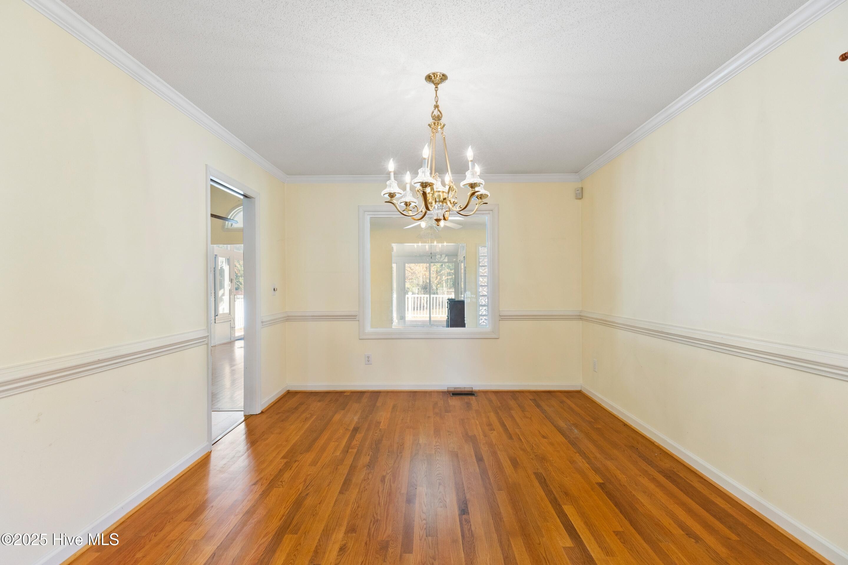 1501 Field View Road Wilmington, NC 28411 - Photo 10 of 57 Formal Dining room or office with pocket door.