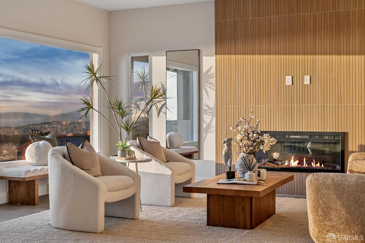 2024 15th Avenue San Francisco, CA 94116 - Photo 5 of 99 a living room with furniture a fireplace and a potted plant