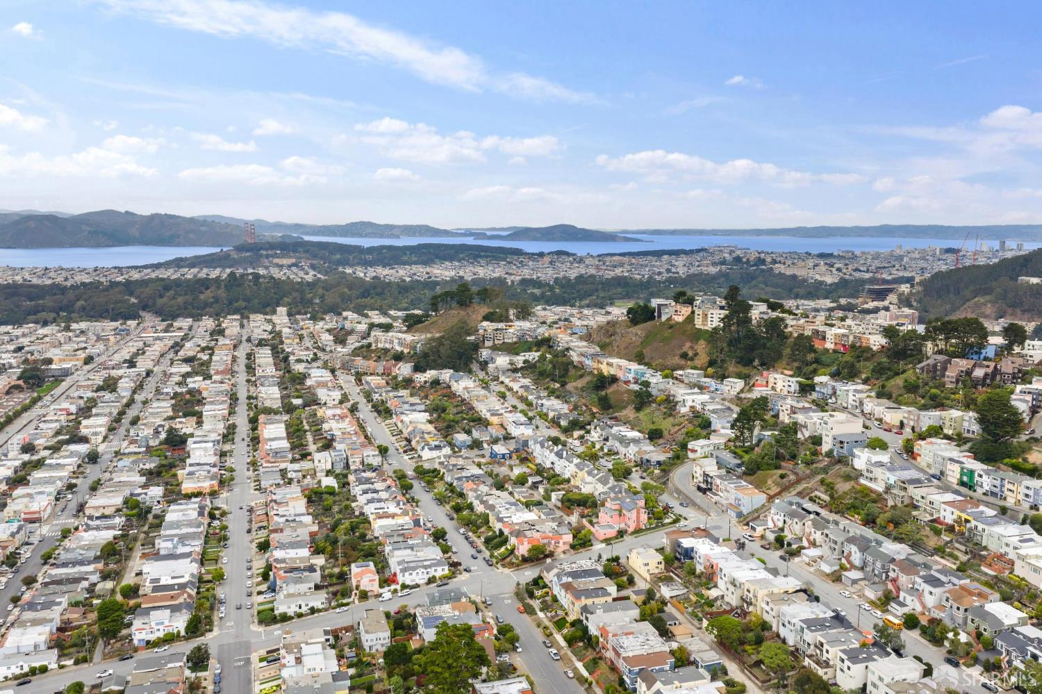 2024 15th Avenue San Francisco, CA 94116 - Photo 97 of 99 an aerial view of residential building and trees around