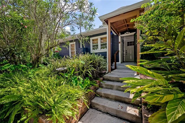 a house with a flower garden