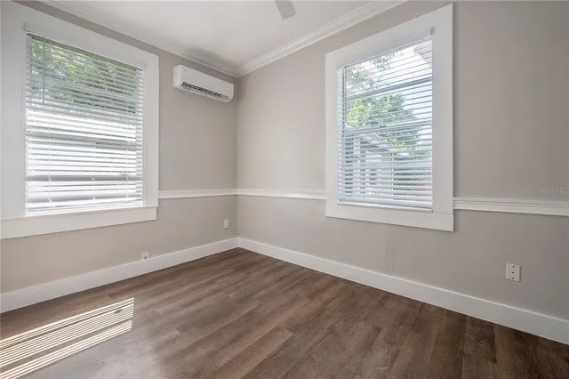 a view of a room that has a window in it