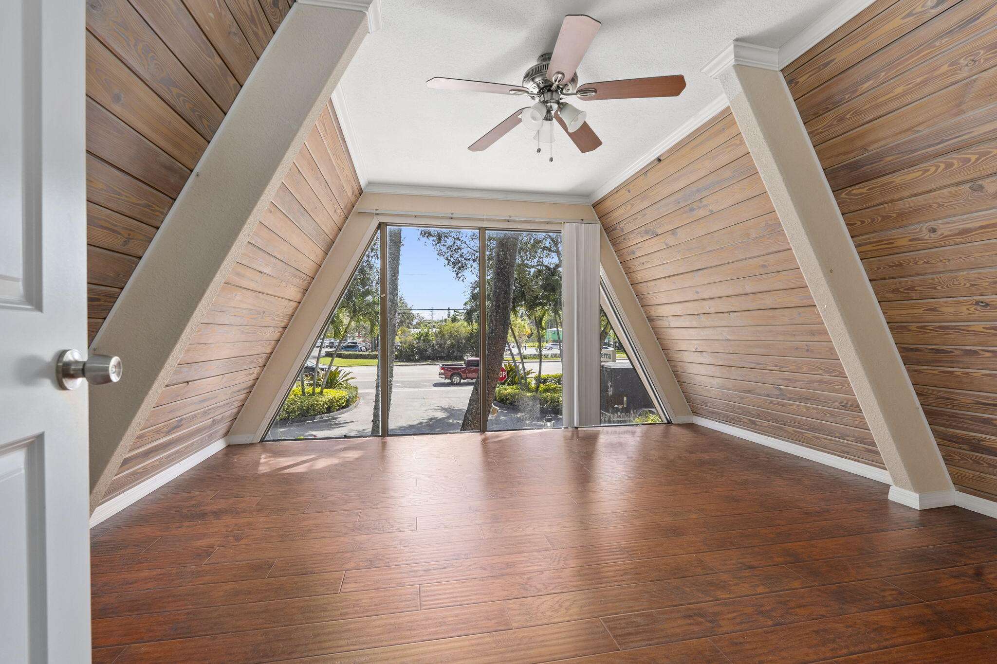 1001 Southeast Monterey Road Stuart, FL 34994 - Photo 15 of 17 a view of an entryway with wooden floor