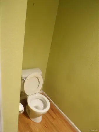 a bathroom with a toilet and sink
