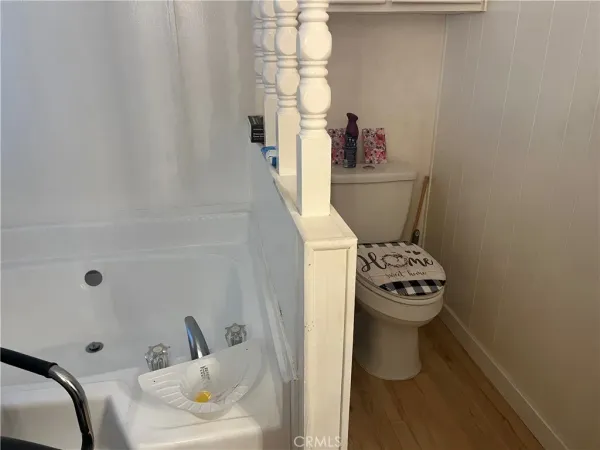 a bathroom with a sink toilet and bathtub