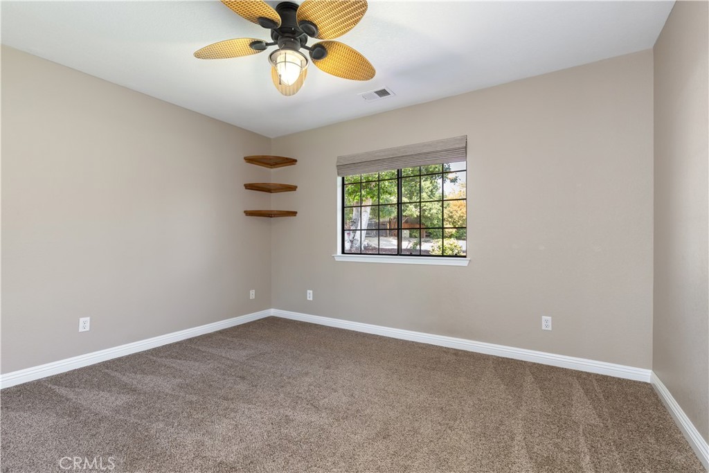 1275 Shane Lane Templeton, CA 93465 - Photo 40 of 70 an empty room with windows and fan