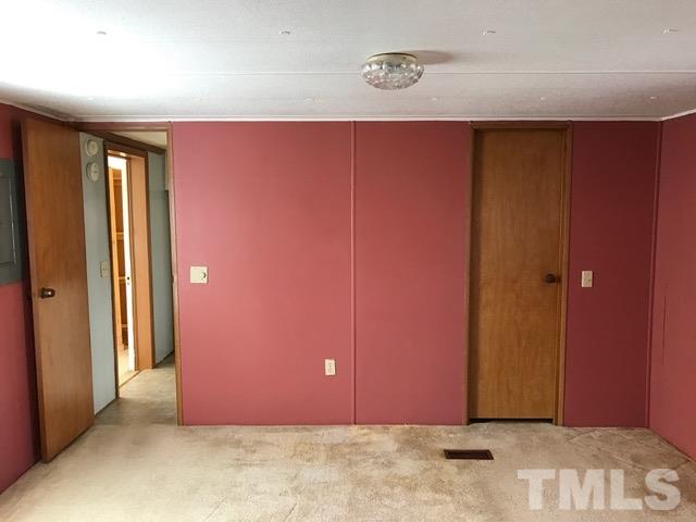 2017 Wiley Road Spring Hope, NC 27882 - Photo 18 of 23 a view of a room with wooden walls