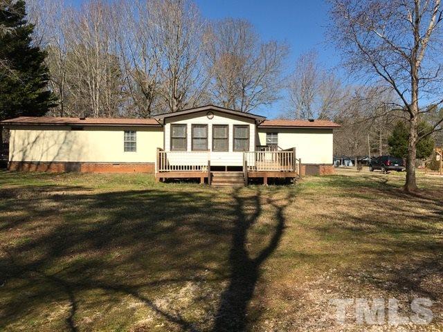 2017 Wiley Road Spring Hope, NC 27882 - Photo 20 of 23 a view of a house with a yard
