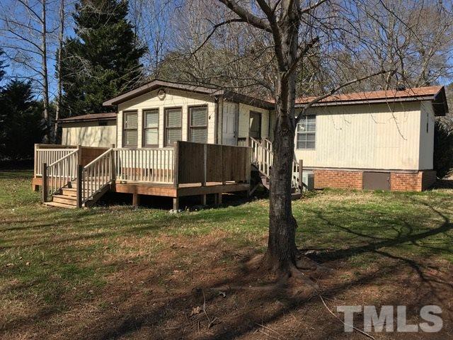 2017 Wiley Road Spring Hope, NC 27882 - Photo 21 of 23 a view of a house with a yard