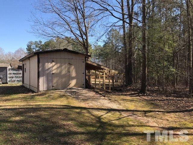 2017 Wiley Road Spring Hope, NC 27882 - Photo 22 of 23 a view of a house with snow on the wall