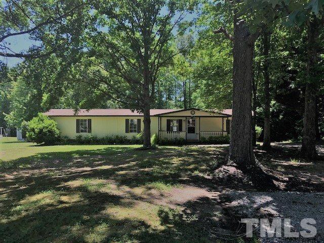 2017 Wiley Road Spring Hope, NC 27882 - Photo 4 of 23 a front view of a house with a yard
