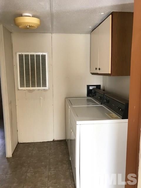 2017 Wiley Road Spring Hope, NC 27882 - Photo 7 of 23 a utility room with cabinets