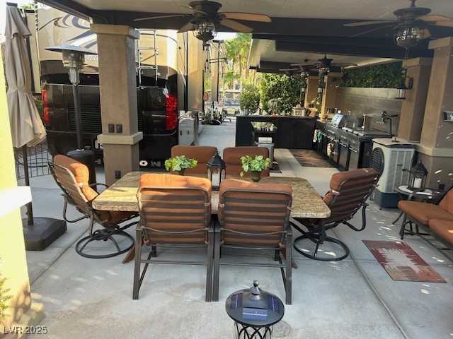 8175 Arville Street, Unit 210 Las Vegas, NV 89139 - Photo 11 of 36 View of patio with outdoor dining space and ceiling fan