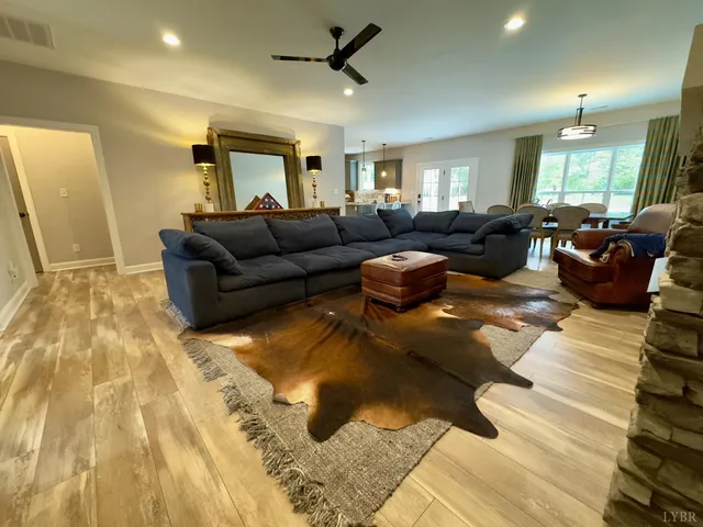 a living room with furniture and a rug