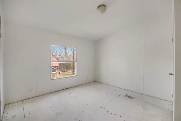 an empty room with a window