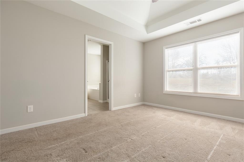 82 Gray Field Court Jefferson, GA 30549 - Photo 19 of 30 a view of an empty room with a window