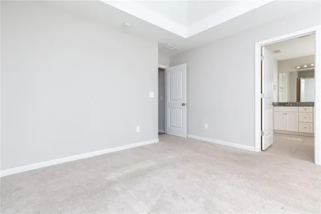 an empty room with entrance door