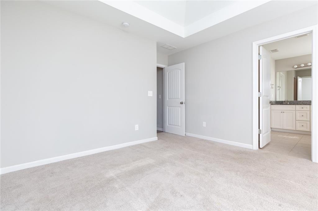 82 Gray Field Court Jefferson, GA 30549 - Photo 20 of 30 an empty room with entrance door