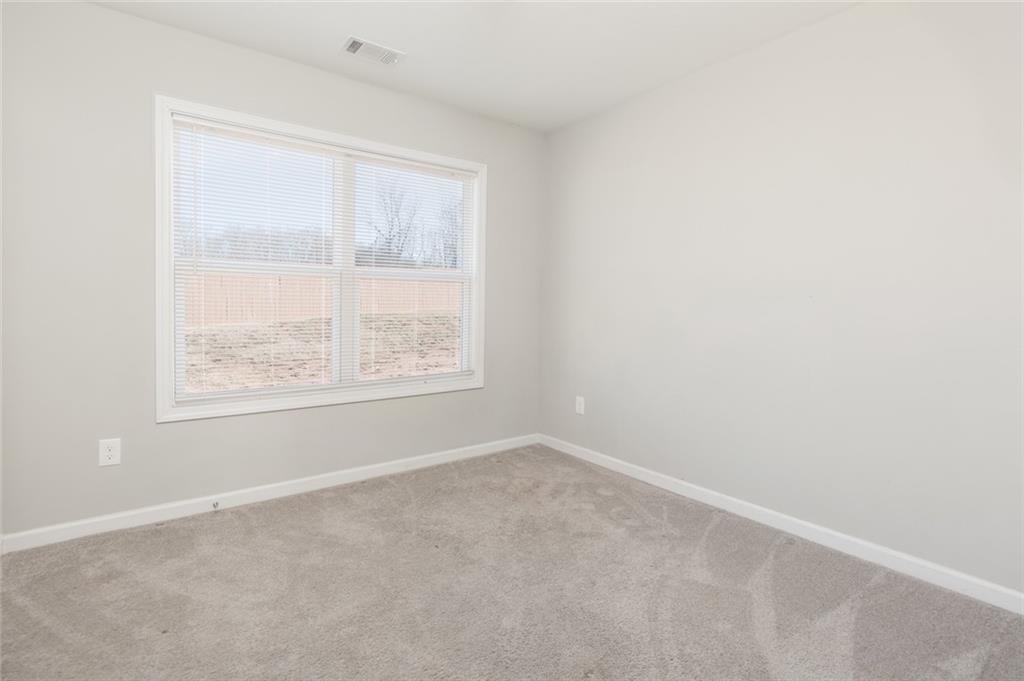 82 Gray Field Court Jefferson, GA 30549 - Photo 23 of 30 an empty room with a window