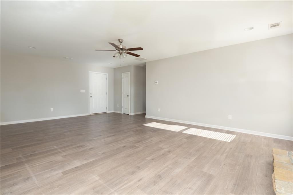 82 Gray Field Court Jefferson, GA 30549 - Photo 6 of 30 a view of an empty room with a window