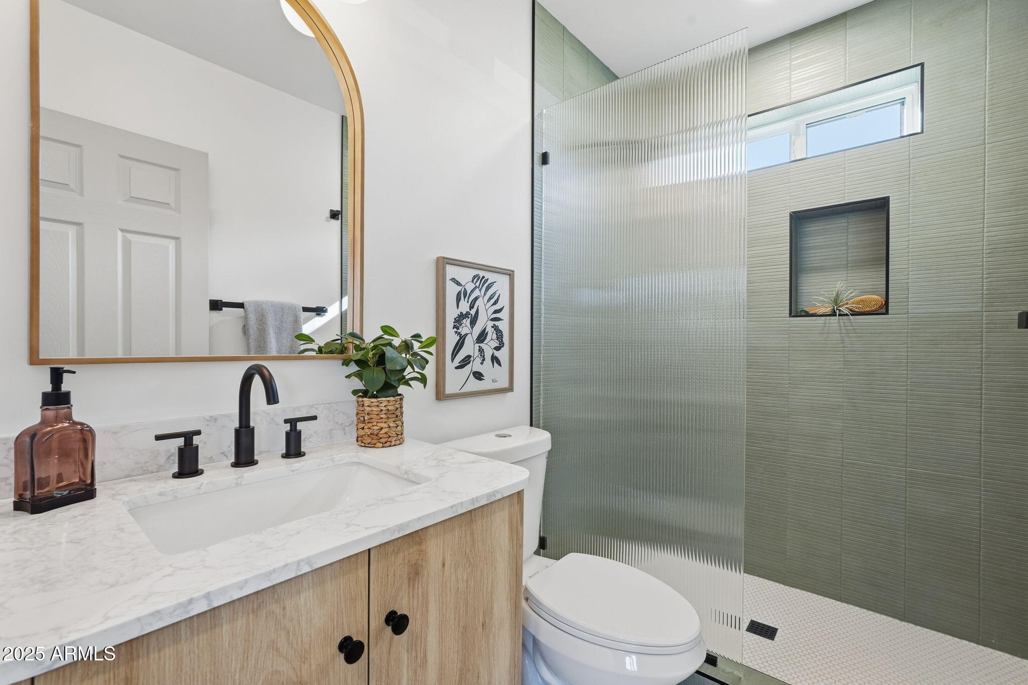 3102 North 34th Street Phoenix, AZ 85018 - Photo 15 of 20 a bathroom with a sink a toilet and shower