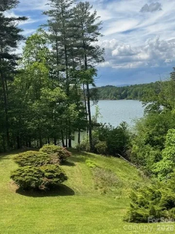 a view of a backyard of the house