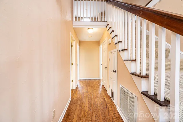 a view of a big room with windows