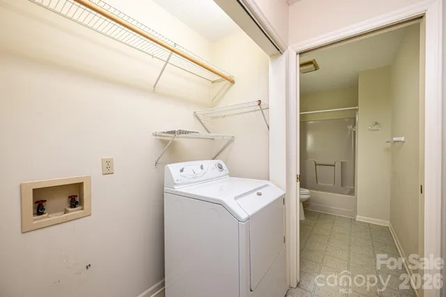 a bathroom with a sink a mirror and a vanity