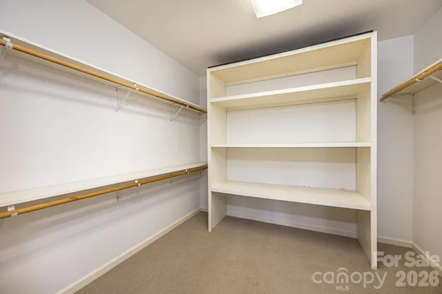 a view of a livingroom with a kitchen