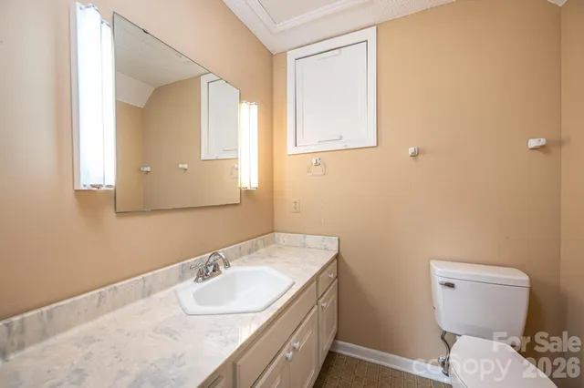 a balcony with wooden floor and fence