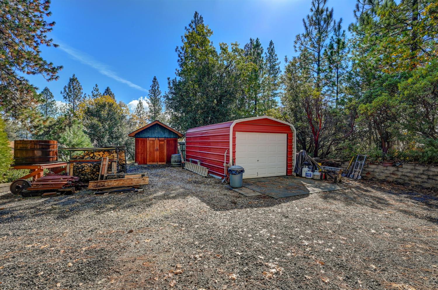 734 Utica Drive Murphys, CA 95247 - Photo 6 of 36 a view of a backyard with a car parked