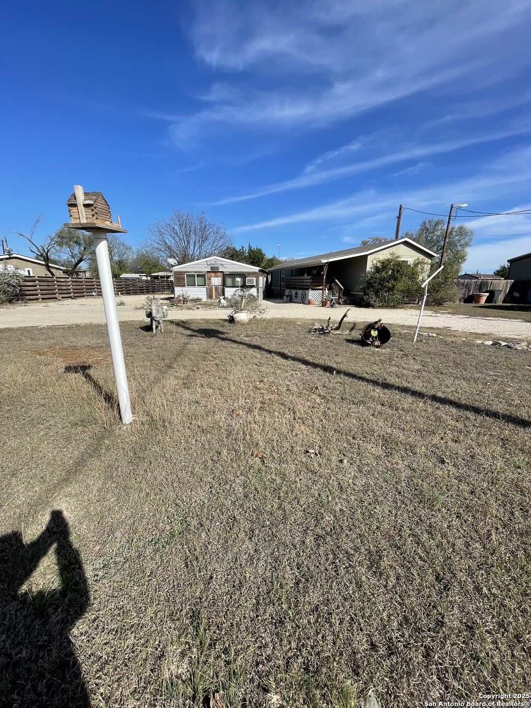 449 Mountain View Drive Bandera, TX 78003 - Photo 3 of 18 a view of a backyard