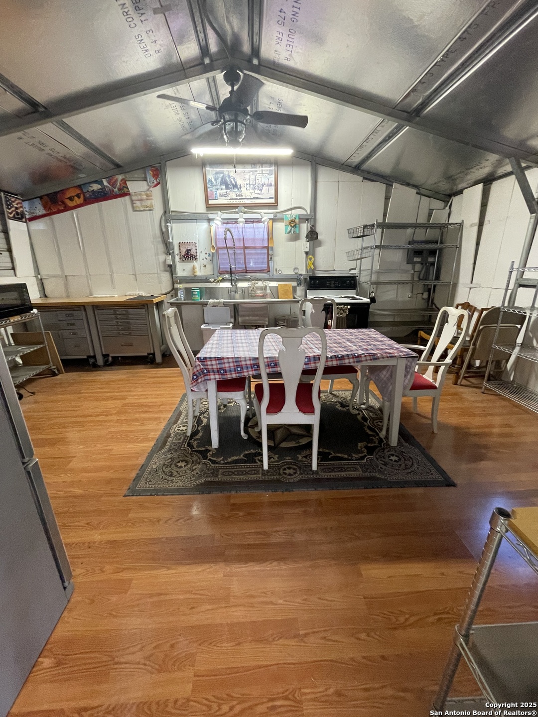449 Mountain View Drive Bandera, TX 78003 - Photo 8 of 18 a living room with lots of furniture and a flat screen tv