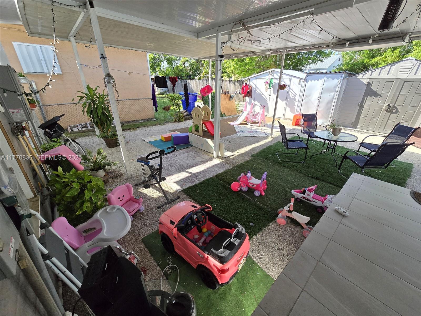 1011 Northwest 64th Street Miami, FL 33150 - Photo 31 of 48 a view of outdoor space