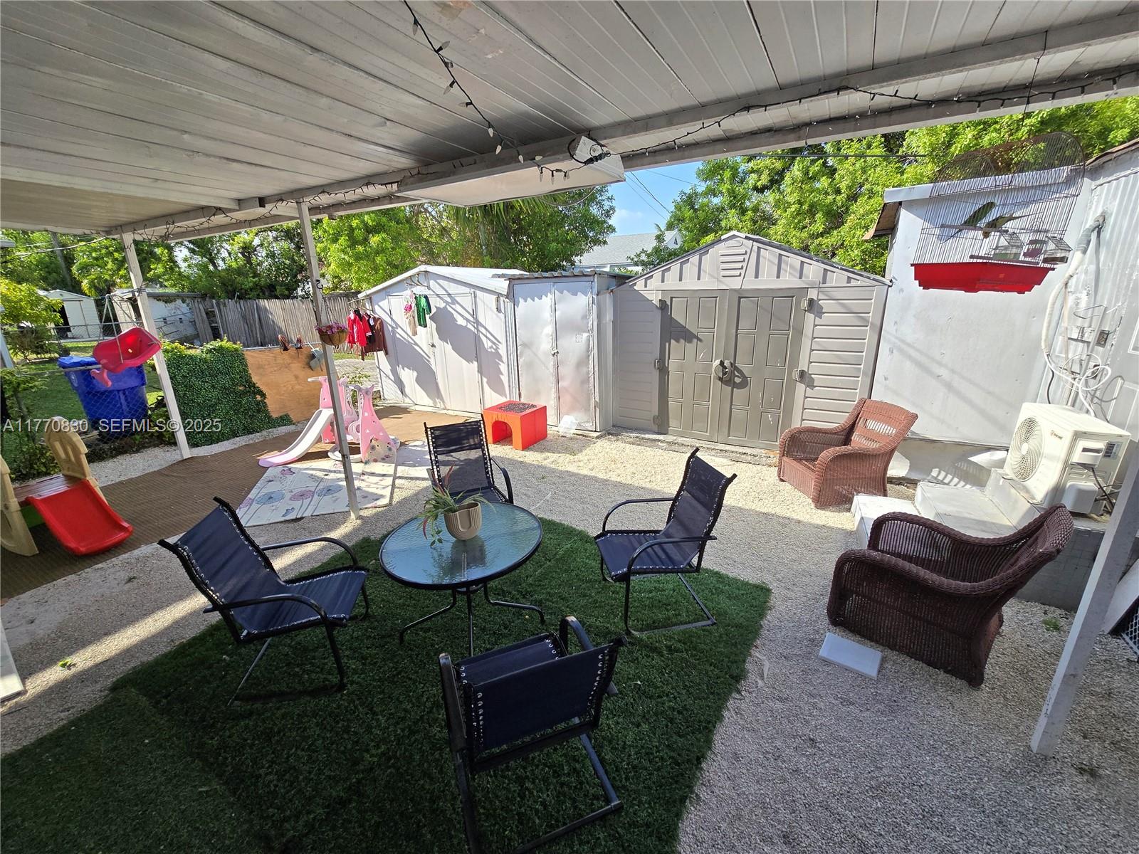 1011 Northwest 64th Street Miami, FL 33150 - Photo 36 of 48 a outdoor space with furniture