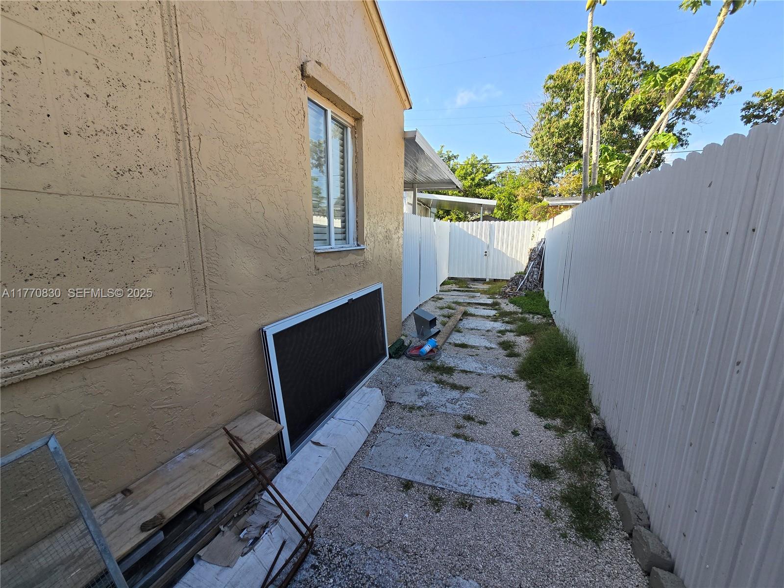 1011 Northwest 64th Street Miami, FL 33150 - Photo 48 of 48 a view of a backyard