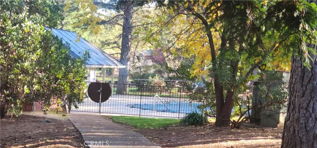 a view of a chair and tables in the patio