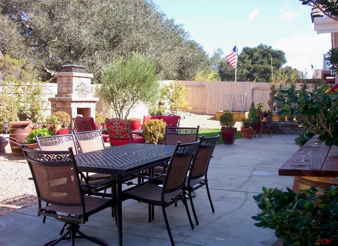 737 Onstott Road Lompoc, CA 93436 - Photo 3 of 22 a view of a dinning table and chairs in the patio