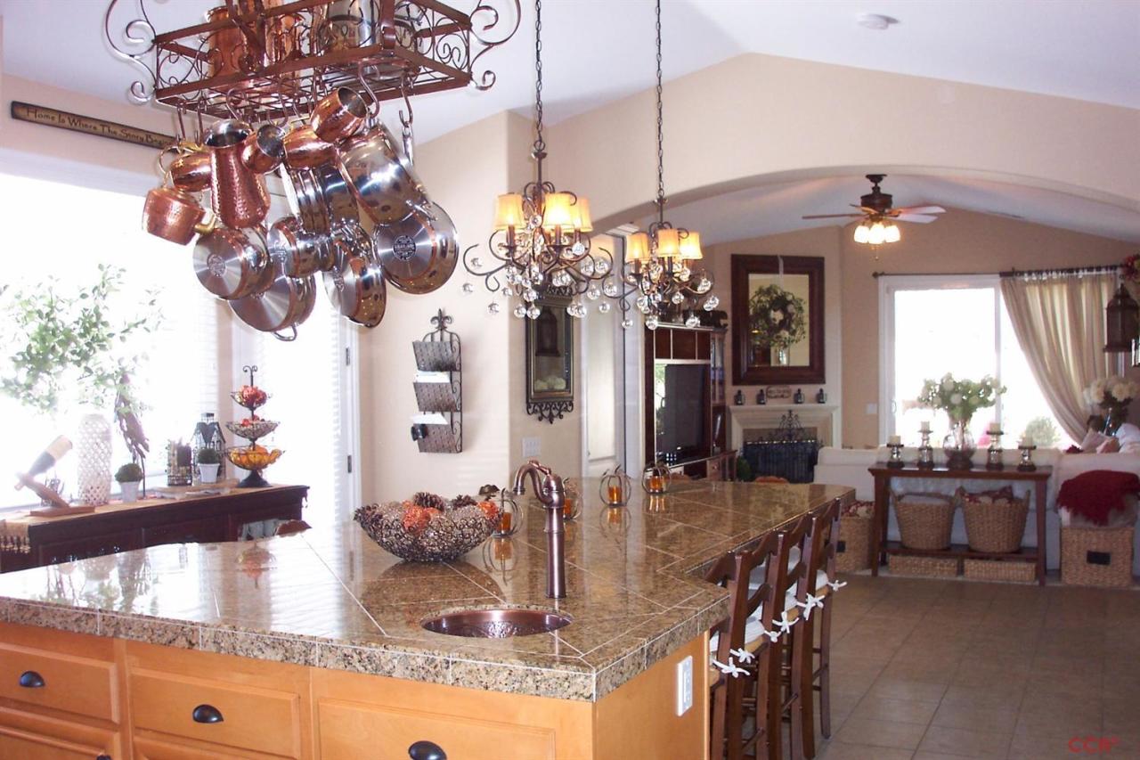 737 Onstott Road Lompoc, CA 93436 - Photo 6 of 22 a dining room with chandelier and living room view