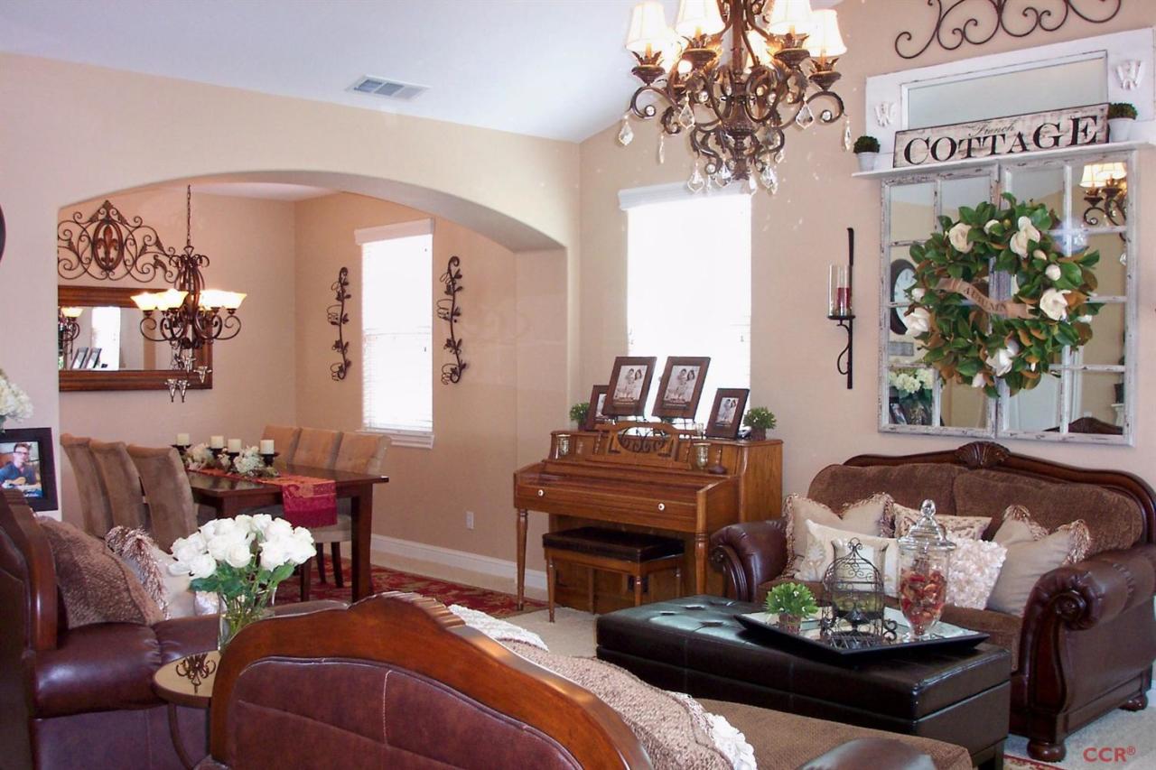 737 Onstott Road Lompoc, CA 93436 - Photo 9 of 22 a living room with furniture and a chandelier