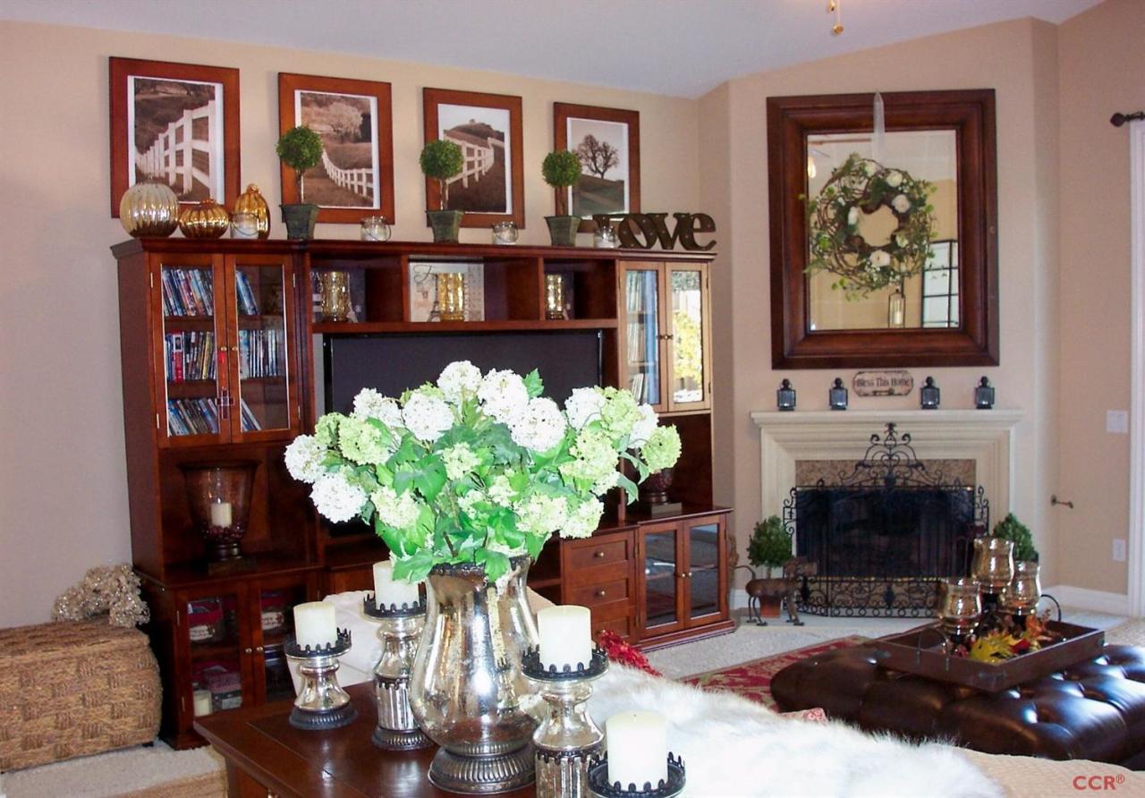 737 Onstott Road Lompoc, CA 93436 - Photo 10 of 22 a living room with furniture fireplace and flower pot