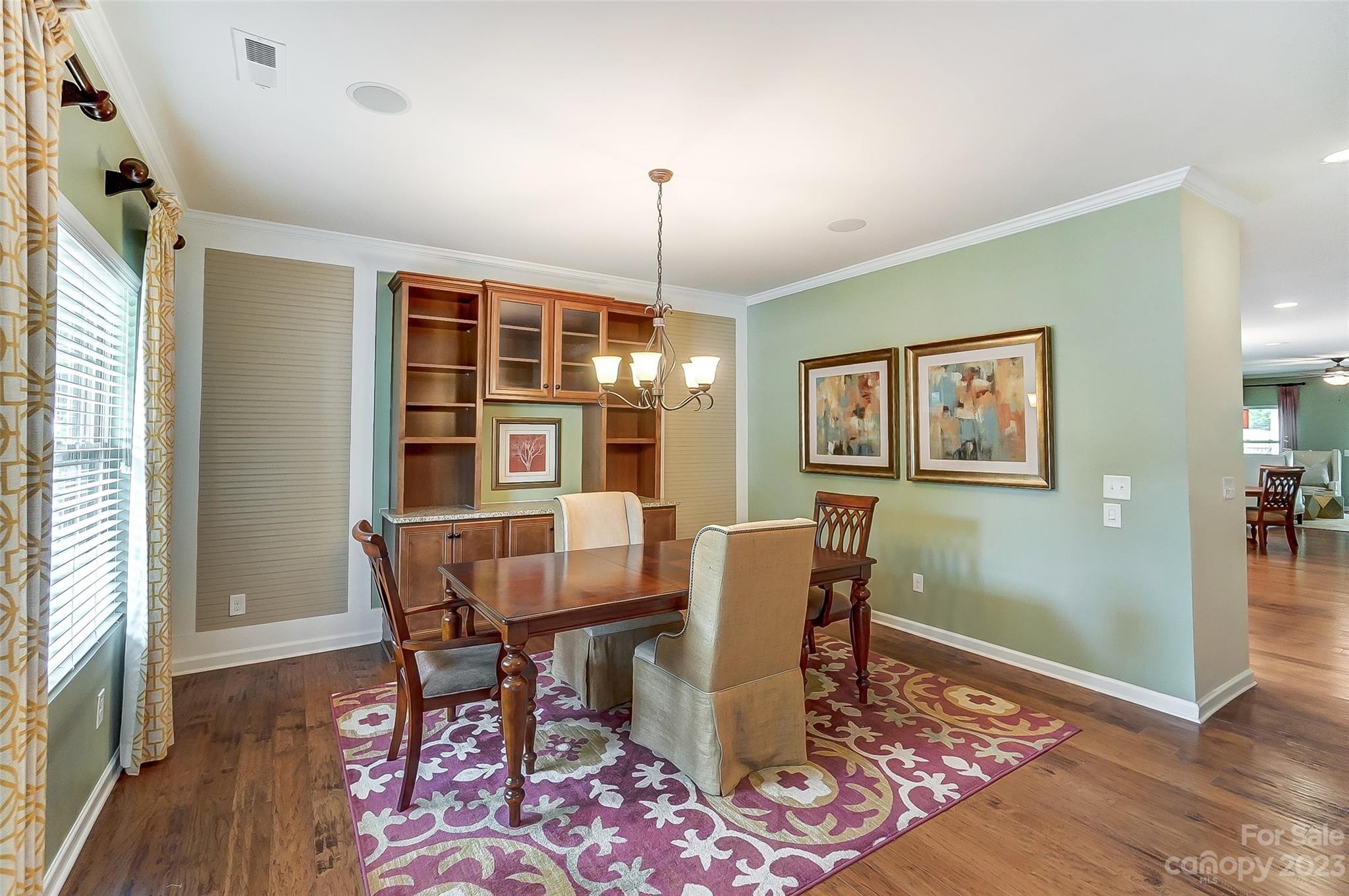 1719 Still River Way Fort Mill, SC 29708 - Photo 11 of 41 a view of a dining room with furniture window and wooden floor