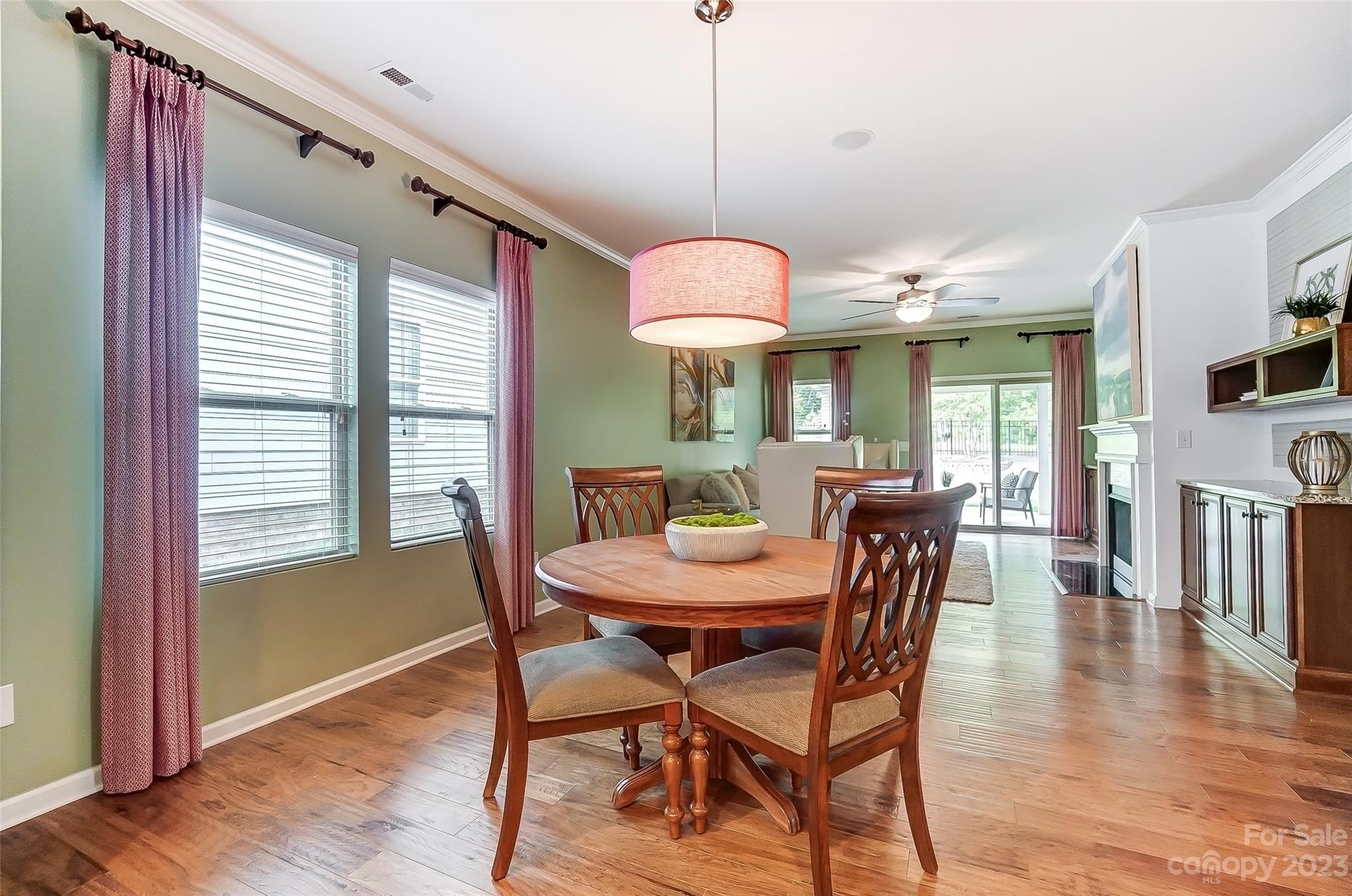 1719 Still River Way Fort Mill, SC 29708 - Photo 14 of 41 a view of a dining room with furniture and a chandelier