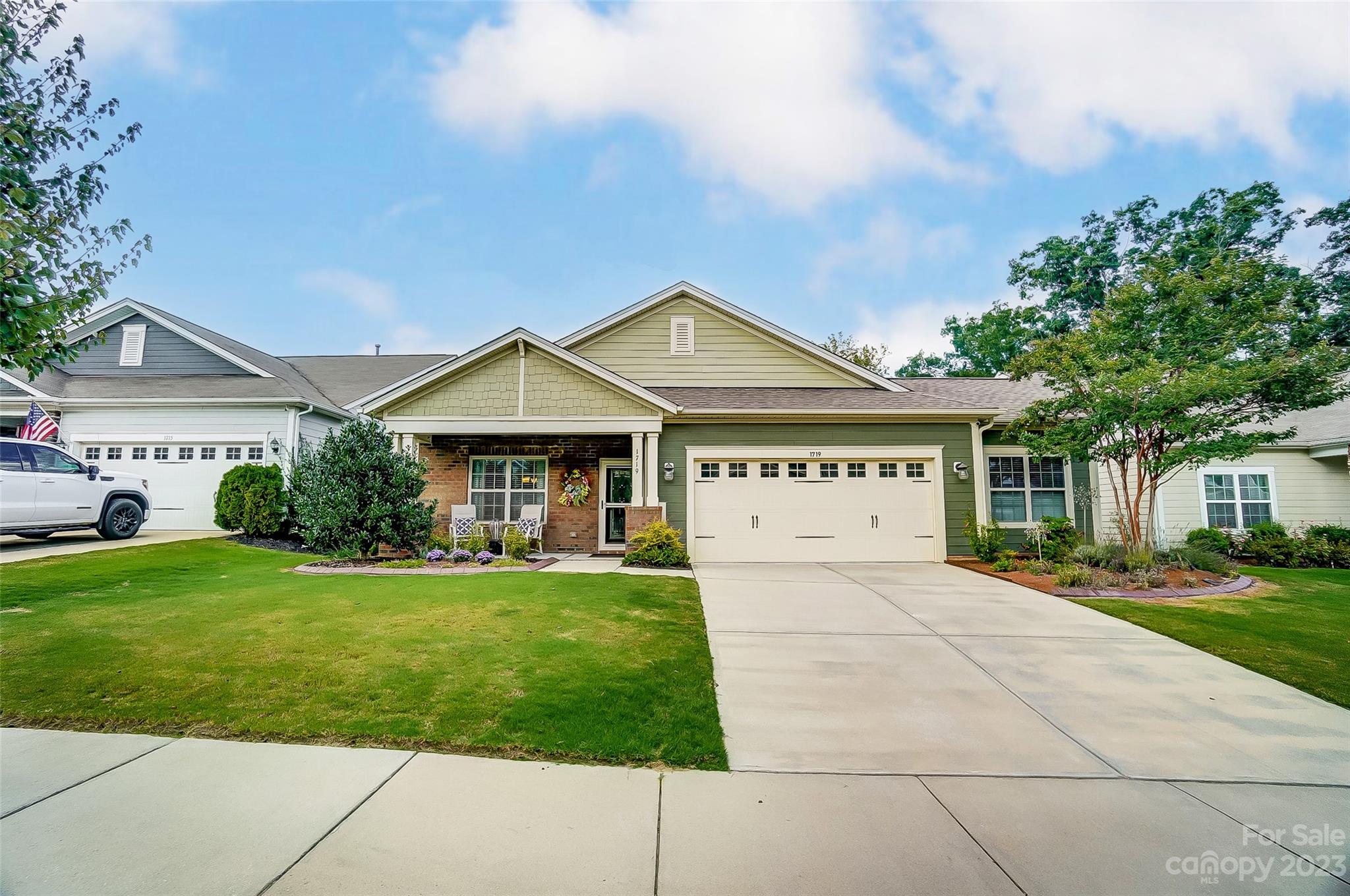 1719 Still River Way Fort Mill, SC 29708 - Photo 2 of 41 a view of a house with a big yard and large trees