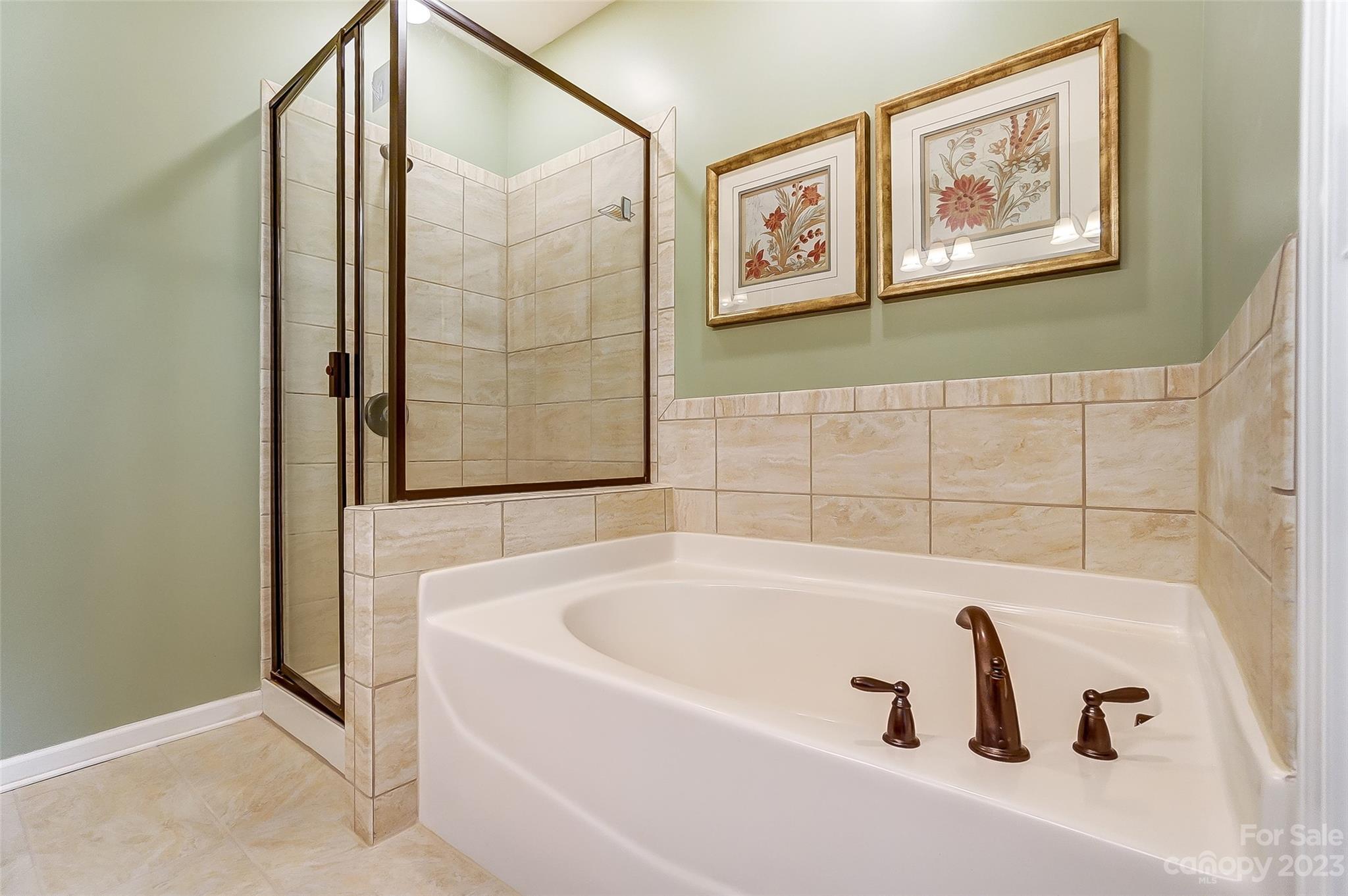 1719 Still River Way Fort Mill, SC 29708 - Photo 22 of 41 a bath tub sitting next to a white wall