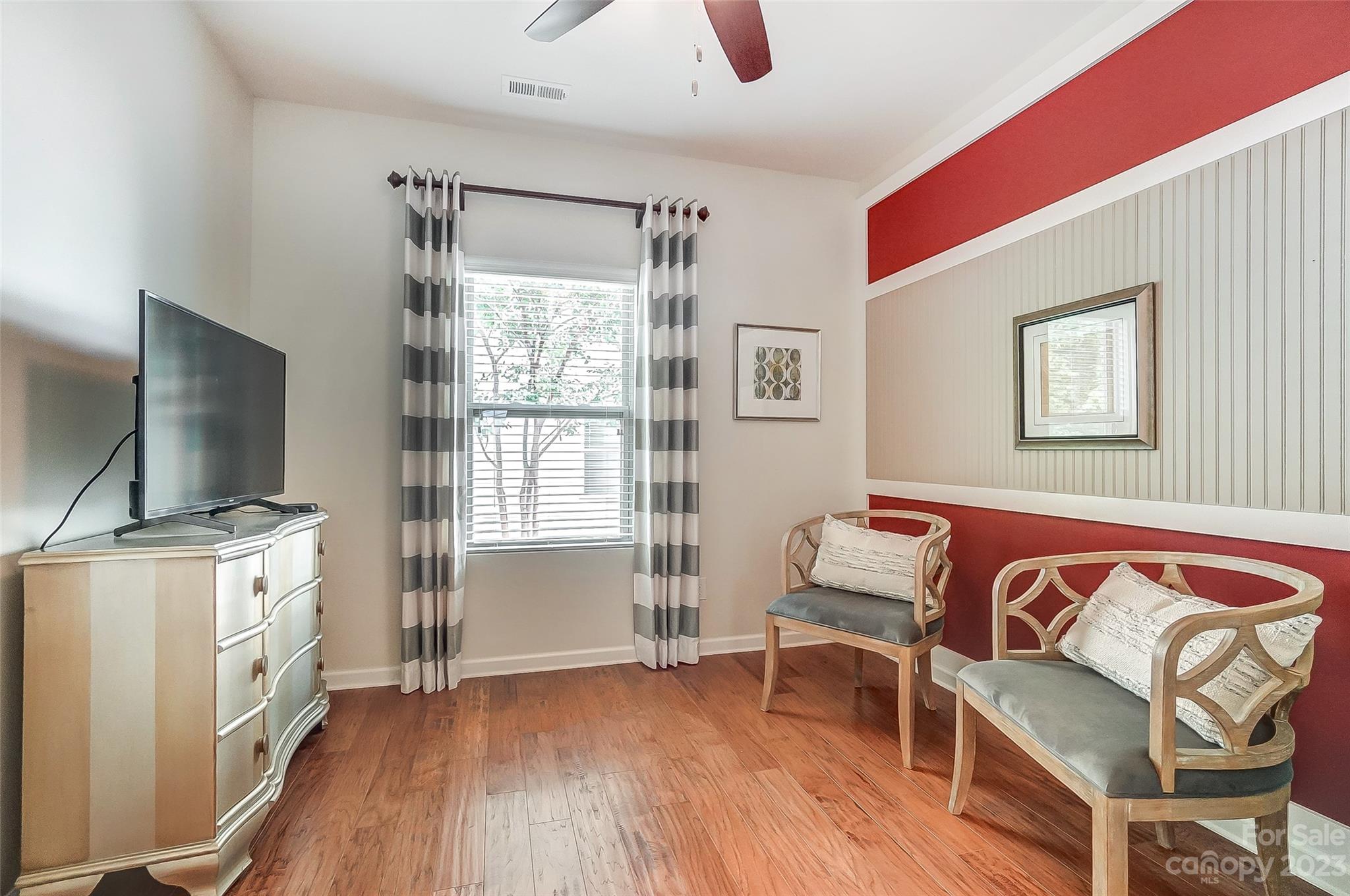 1719 Still River Way Fort Mill, SC 29708 - Photo 25 of 41 a living room with furniture and a flat screen tv