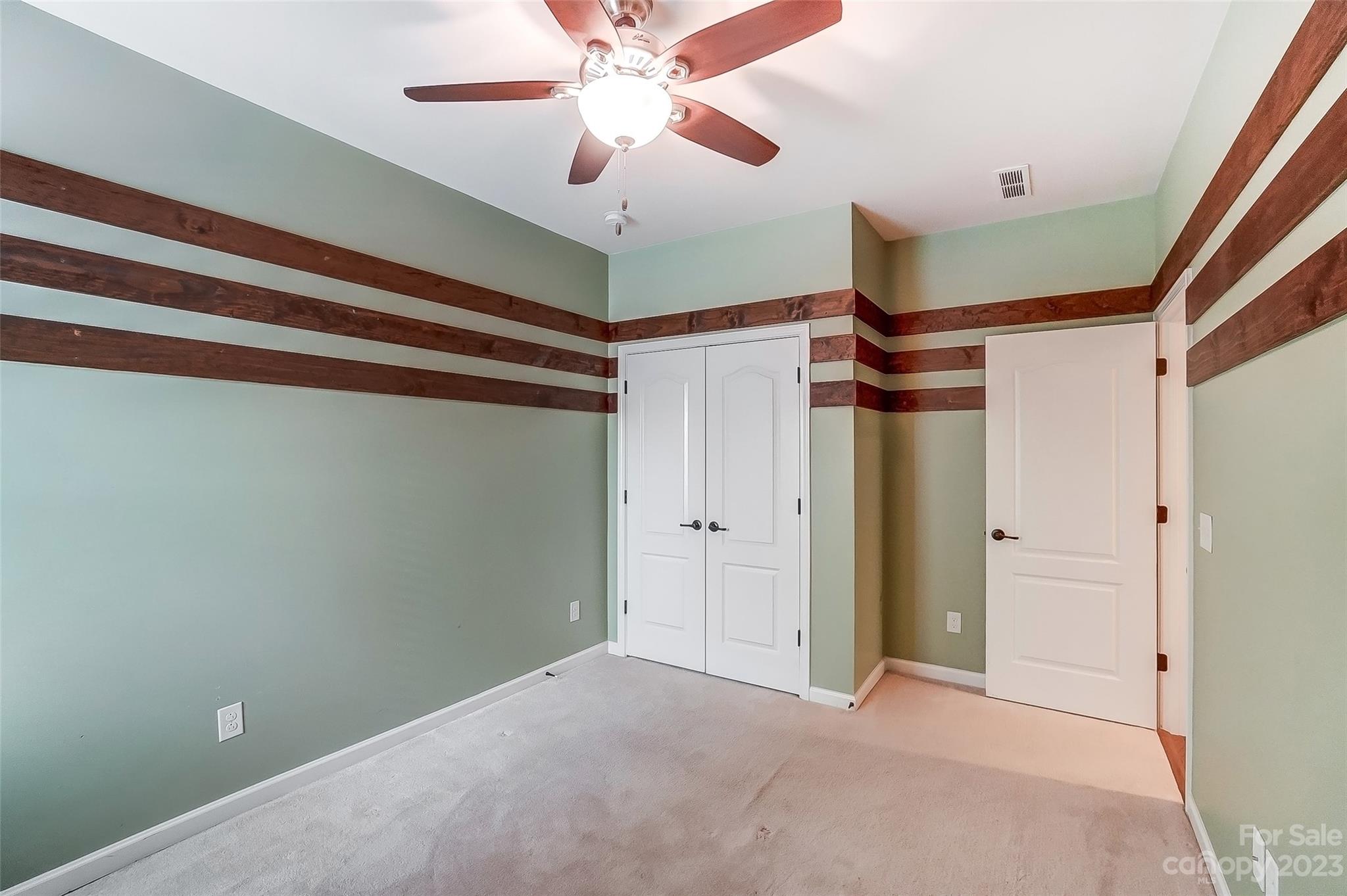 1719 Still River Way Fort Mill, SC 29708 - Photo 26 of 41 a view of empty room with a ceiling fan and window