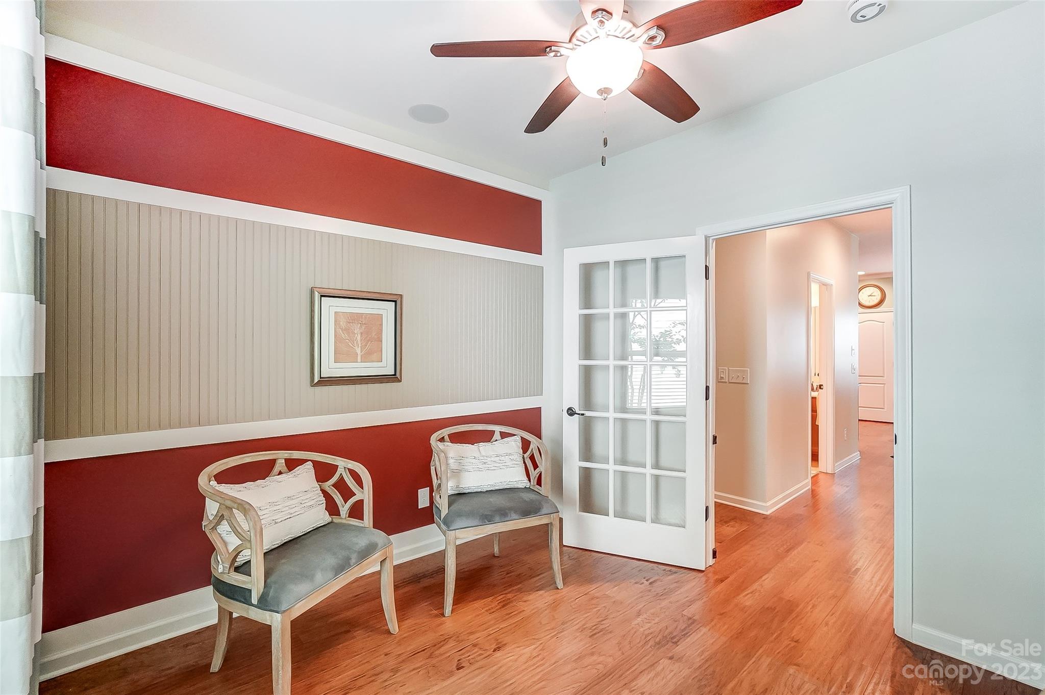 1719 Still River Way Fort Mill, SC 29708 - Photo 29 of 41 a view of a livingroom with wooden floor and a ceiling fan